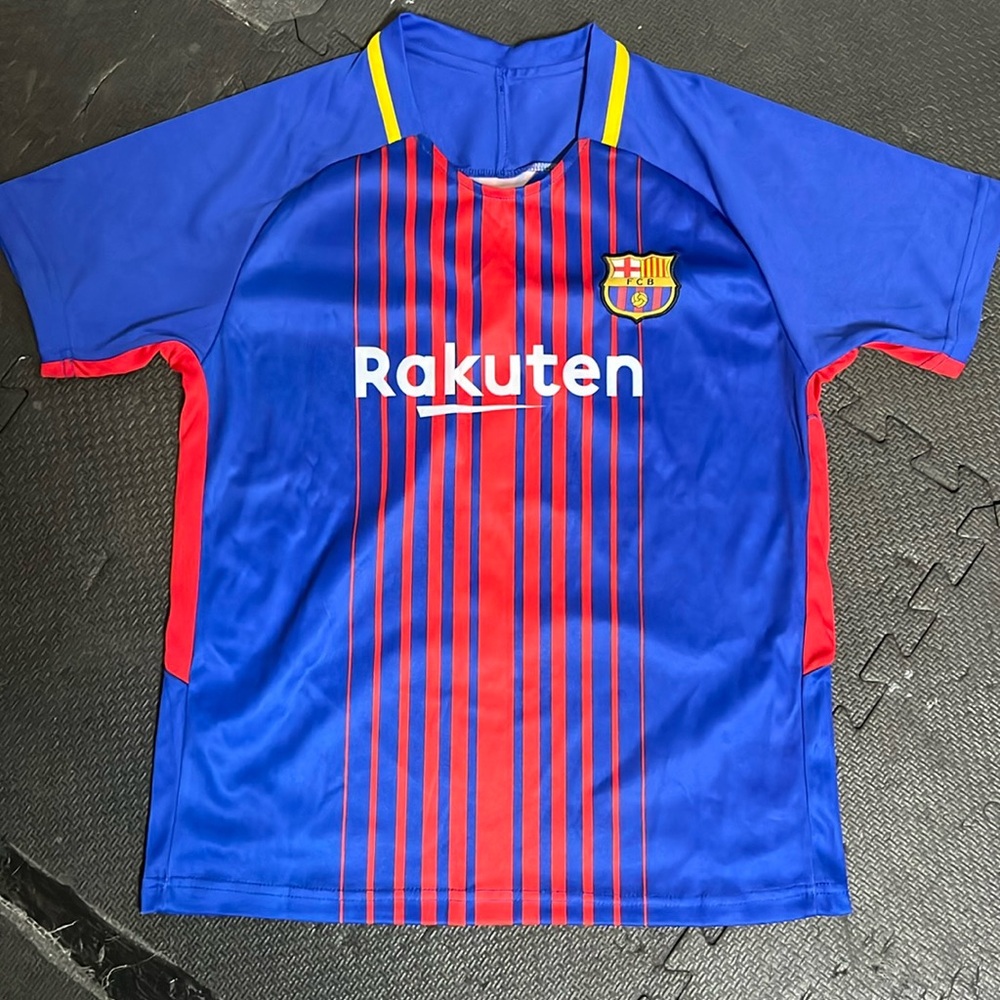 FC Barcelona youth soccer shirt .
10-12, not official